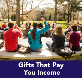 Rollover image of a class outside. Link to Gifts That Pay You Income.